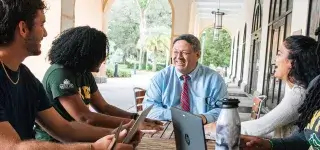 web-featured-dr-dadez-with-students